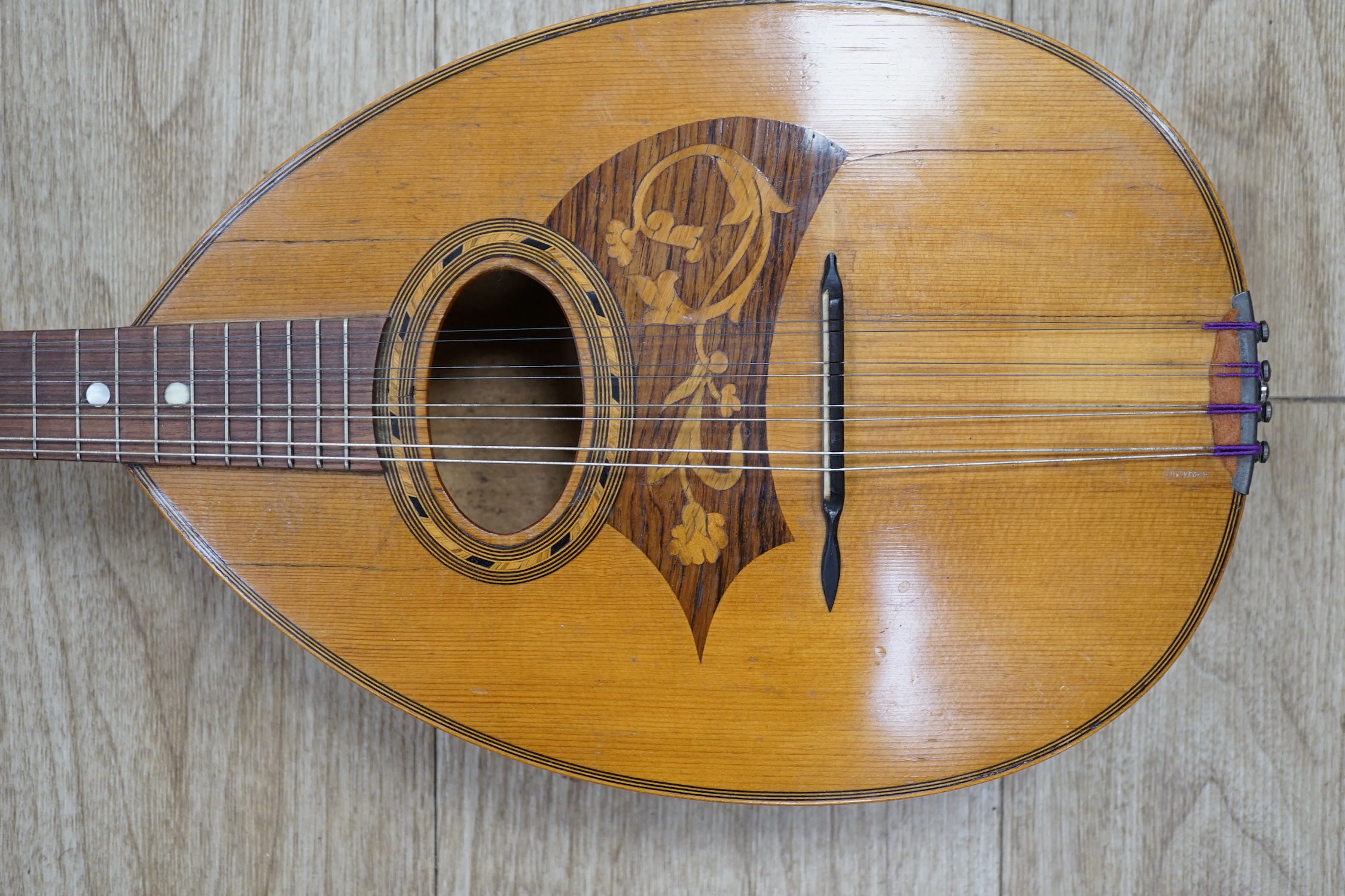 A 1920's Swiss flat backed mandolin, length of body 31cm